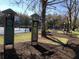 Outdoor community exercise area with fitness equipment and a playground in the background, perfect for active residents at 1080 Abell Cir, Oviedo, FL 32765