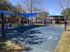 Brightly colored community playground with picnic tables, a basketball court and hopscotch squares at 1080 Abell Cir, Oviedo, FL 32765