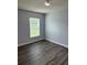 A serene bedroom features a ceiling fan and a window with natural light at 10800 Cherry Oak Cir, Orlando, FL 32817