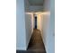 Hallway featuring luxury vinyl plank flooring and neutral paint at 10800 Cherry Oak Cir, Orlando, FL 32817