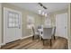 Cozy dining area with modern lighting and view of the backyard at 1416 E 20Th St, Sanford, FL 32771