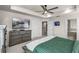 Spacious main bedroom featuring a trey ceiling, a ceiling fan, and neutral decor at 14554 Black Cherry Trl, Winter Garden, FL 34787