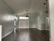 View of a living room with modern flooring and high ceilings with ceiling fan at 14954 Lady Victoria Blvd, Orlando, FL 32826