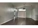 View of a living room with modern flooring and high ceilings with ceiling fan at 14954 Lady Victoria Blvd, Orlando, FL 32826