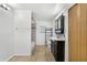Spacious bathroom with a bathtub and shower, sink vanity, storage, and tile flooring at 1622 Dolphin Dr, St Cloud, FL 34771
