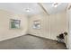 Comfortable bedroom with carpet flooring, bright windows, and natural light at 1622 Dolphin Dr, St Cloud, FL 34771