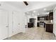 Spacious kitchen featuring stainless steel appliances, tile backsplash, and direct access to additional rooms at 1622 Dolphin Dr, St Cloud, FL 34771