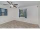 Bedroom features natural light, ceiling fan and tile flooring at 200 Avenue C, Chuluota, FL 32766