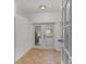 Hallway features tile flooring and exterior access to yard at 200 Avenue C, Chuluota, FL 32766