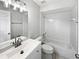 Clean, well-lit bathroom featuring a shower-tub combo and a vanity at 2720 Settlers Trl, St Cloud, FL 34772