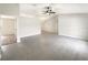 Large living room with tile floors, neutral colors, and open concept design at 30 Hemlock Trce, Ocala, FL 34472