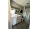 Clean bathroom featuring a marble countertop, modern sink, and walk-in shower at 307 N Oak Ave, Fort Meade, FL 33841