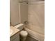 This bathroom features a toilet, shower and single sink vanity with a mirror at 325 Wymore Rd # 203, Altamonte Springs, FL 32714