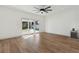 Bright living area with ceiling fan, recessed lights and sliding glass doors to a patio at 3632 E Kaley Ave, Orlando, FL 32812