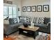 Cozy living room with a sectional sofa and decorative pillows at 382 Raleigh Pl, Oviedo, FL 32765