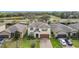 Overhead view of a suburban home featuring a landscaped yard, two-car garage, and neat design at 5311 Brydon Woods Cir, St Cloud, FL 34771