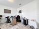 Bright office featuring neutral walls, a work space, and a patterned rug adding warmth to the room at 5311 Brydon Woods Cir, St Cloud, FL 34771