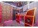 Whimsical ' bedroom featuring a themed bunk bed and playful pirate decor accents at 540 Sticks St, Davenport, FL 33896