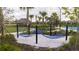 Community hammock garden featuring multiple blue rope hammocks on a white sand base at 540 Sticks St, Davenport, FL 33896