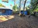 The backyard has a storage shed, trees, and partial brick ground cover at 621 Daron Ct, Winter Springs, FL 32708