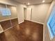 Bedroom with laminate flooring and a mirrored closet at 621 Daron Ct, Winter Springs, FL 32708