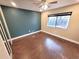 Bedroom with laminate flooring, ceiling fan and natural light at 621 Daron Ct, Winter Springs, FL 32708