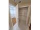 Dual closets featuring adjustable shelving, tile and hard surface flooring at 621 Daron Ct, Winter Springs, FL 32708