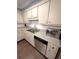 Bright kitchen featuring stainless steel dishwasher and ample counter space at 621 Daron Ct, Winter Springs, FL 32708