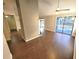 Well-lit living room with hardwood floors and sliding glass doors at 621 Daron Ct, Winter Springs, FL 32708