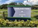 Sunland Park community sign located in Seminole County with trees in the background at 704 Baywood Dr, Sanford, FL 32773