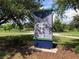 Lake Dot Park community sign located in Seminole County with a lake in the background at 704 Baywood Dr, Sanford, FL 32773