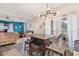 Open-concept dining area with wood floors and natural light at 704 Baywood Dr, Sanford, FL 32773