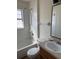 Well-lit bathroom featuring a tub and shower combo with vanity sink at 7314 Seena Ct, Orlando, FL 32835