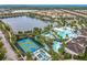 An aerial view showcases the community's resort-style amenities, including a pool, lazy river, fitness center, and basketball court at 8941 Rhodes St, Kissimmee, FL 34747