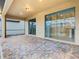 Covered patio featuring brick pavers and sliding glass doors at 8941 Rhodes St, Kissimmee, FL 34747