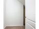 Cozy storage closet featuring neutral carpet and white painted walls at 8941 Rhodes St, Kissimmee, FL 34747