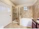 Bathroom featuring a bathtub, shower, and toilet at 912 Charo Pkwy # 214, Davenport, FL 33897