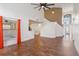 Expansive living room with soaring ceilings and a view into the home's entryway and staircase at 965 Rosinia Ct, Orlando, FL 32828