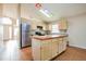Spacious kitchen featuring an island, stainless steel appliances, and ample cabinet space at 1019 Royal Oaks Dr, Apopka, FL 32703