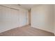 Bedroom featuring plush carpeting and a closet with sliding doors at 1136 Clay Blvd, Tavares, FL 32778