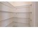 Walk-in pantry closet with metal shelving at 1136 Clay Blvd, Tavares, FL 32778