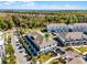 Scenic aerial view of a well-planned community surrounded by lush greenery and tranquil water views at 1194 Spotted Sandpiper Loop, Winter Springs, FL 32708