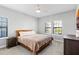 Cozy bedroom with neutral walls, plush carpeting, and a ceiling fan at 1194 Spotted Sandpiper Loop, Winter Springs, FL 32708