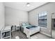 Bright bedroom with carpet, desk, and natural light at 1194 Spotted Sandpiper Loop, Winter Springs, FL 32708