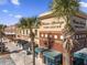 Charming town center with palm trees and brick accents, offering a variety of shops and services at 1194 Spotted Sandpiper Loop, Winter Springs, FL 32708
