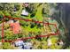 An aerial view showcasing the expansive property with its waterfront access and serene surroundings at 12002 Mckinnon Rd, Windermere, FL 34786