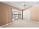 A bedroom offers lots of light, a bay window, and plenty of closet space at 12002 Mckinnon Rd, Windermere, FL 34786