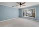 Cozy bedroom with a large bay window letting in natural light at 12002 Mckinnon Rd, Windermere, FL 34786