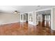 A large living area offers natural light, an open layout, and tiled floors at 12002 Mckinnon Rd, Windermere, FL 34786