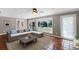 Sunroom with terracotta tile floors and a large window overlooking the backyard at 12002 Mckinnon Rd, Windermere, FL 34786